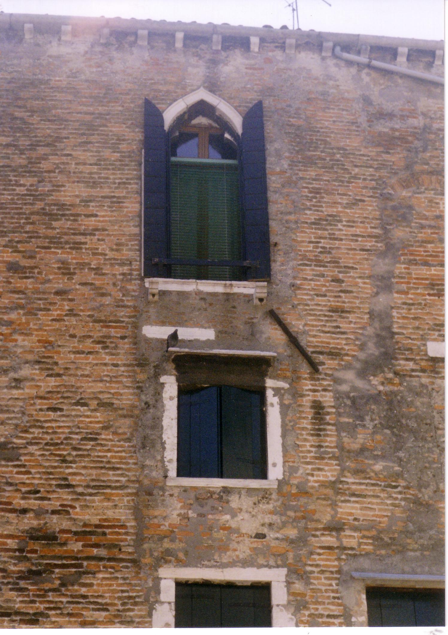 This upper story single window drawn by Ruskin  is the Case Zane. It is on the left side of the campo as you approach in the direction of the church coming over the bridge. (S. Croce 2172).