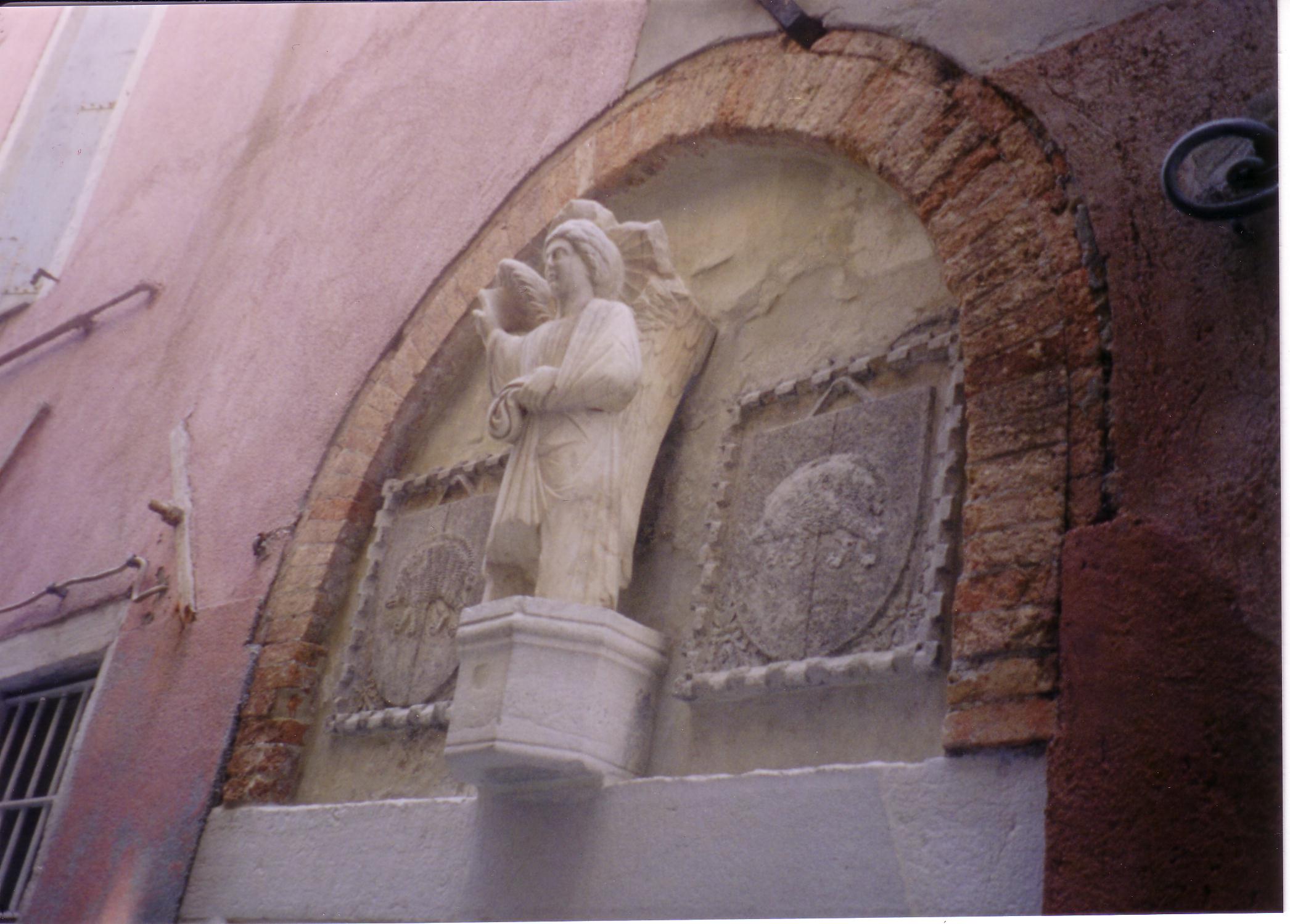 Door-Head with angel and projecting octagon bracket