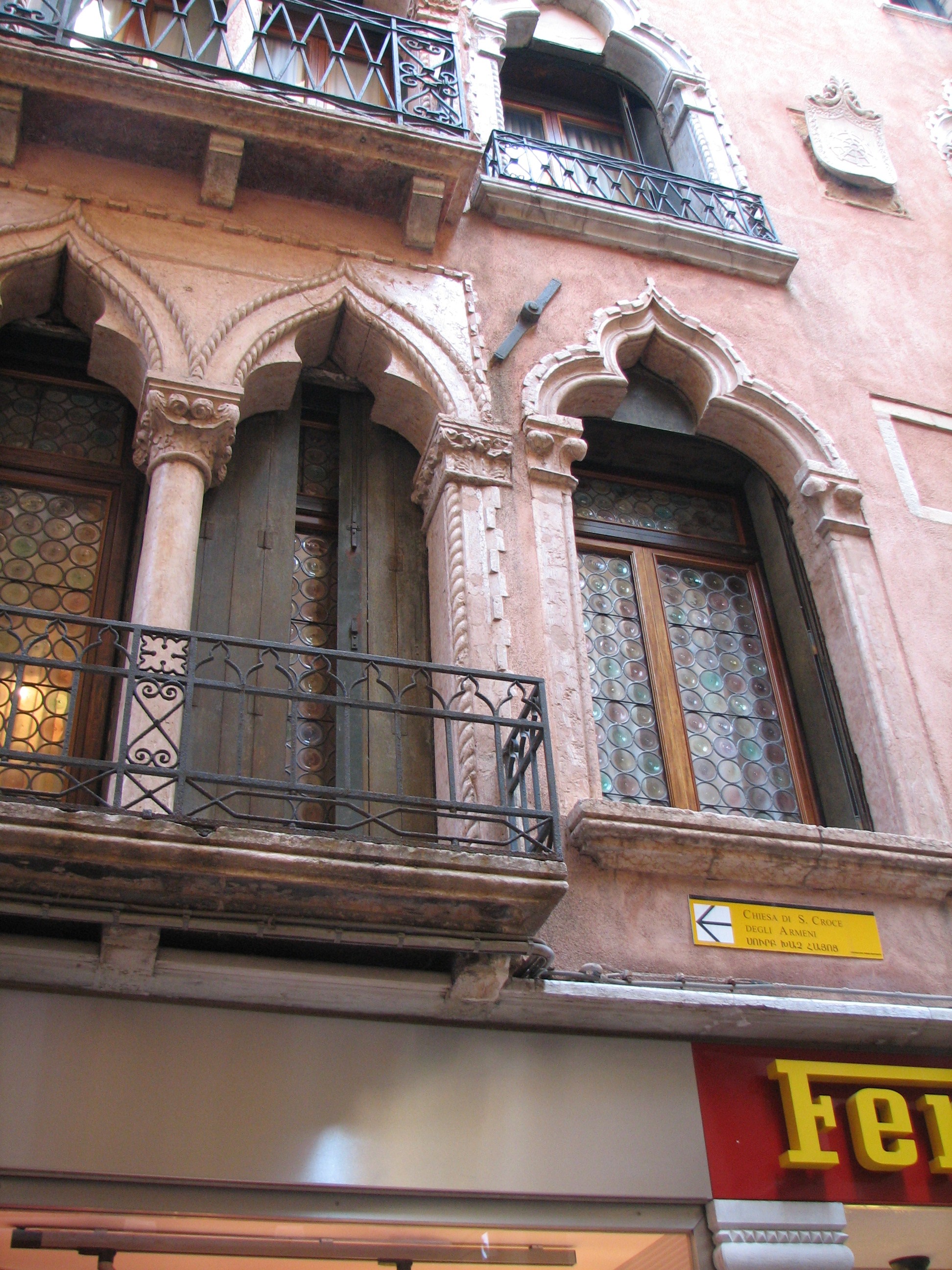 Detail of two adjoining houses in Merceria S. Zulian with part of an attached 5th Order window of the house to the left