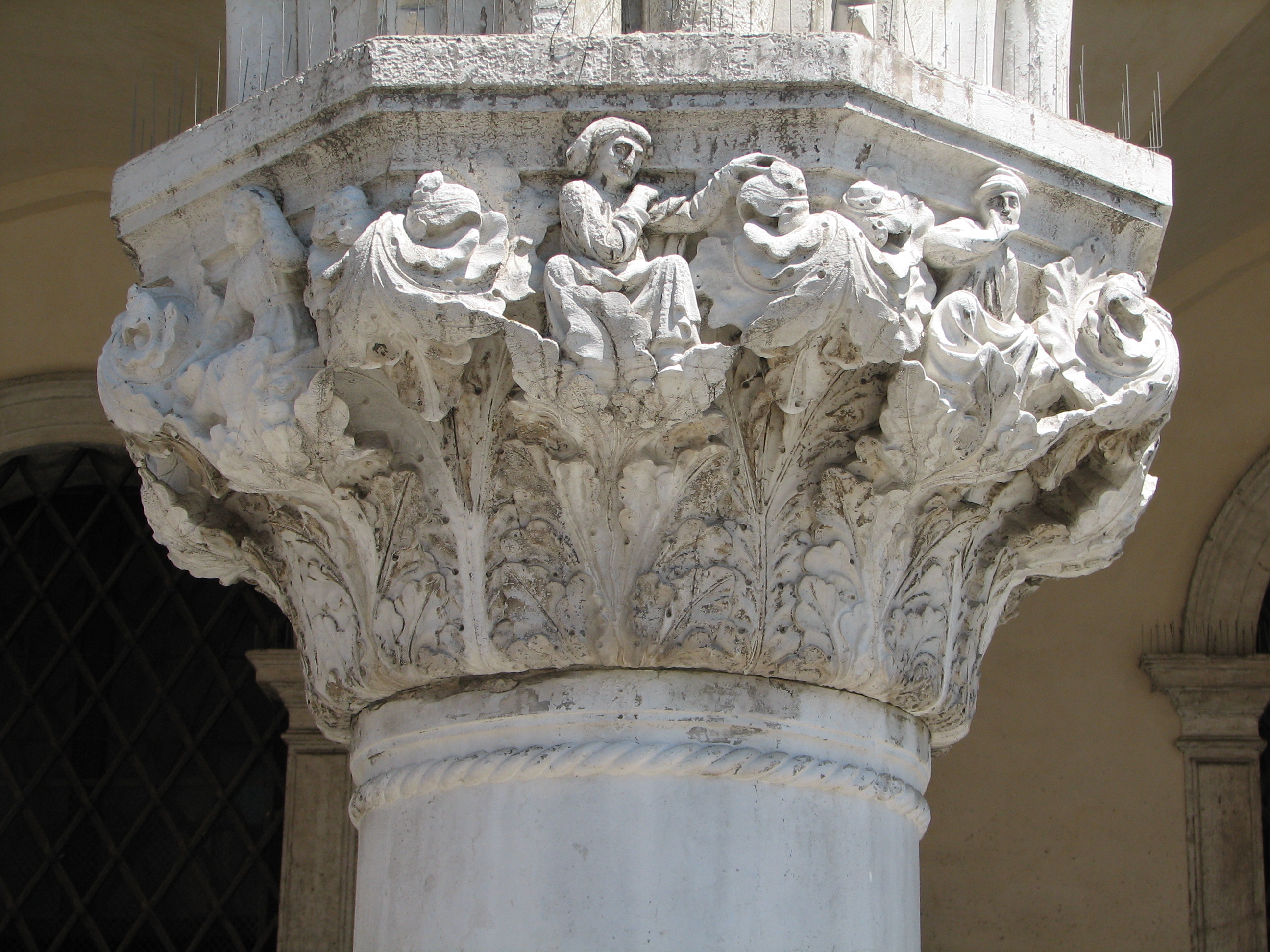 Lower Capitals of Ducal Palace: No 32 (5) Fully robed figures