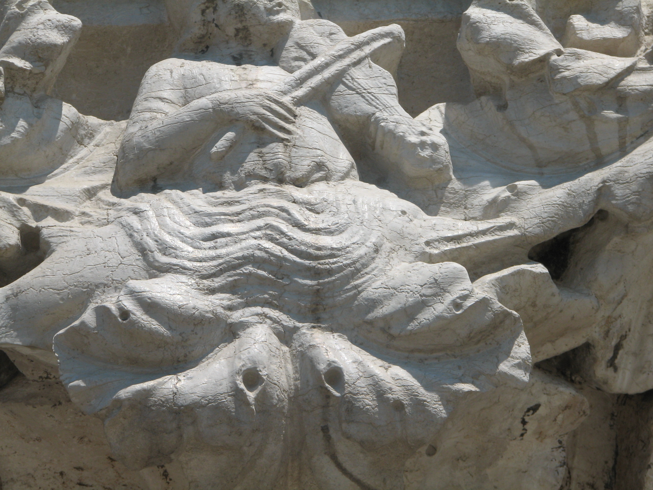 Lower Capitals of the Ducal Palace. Detail of 8th Capital.  Dolphin