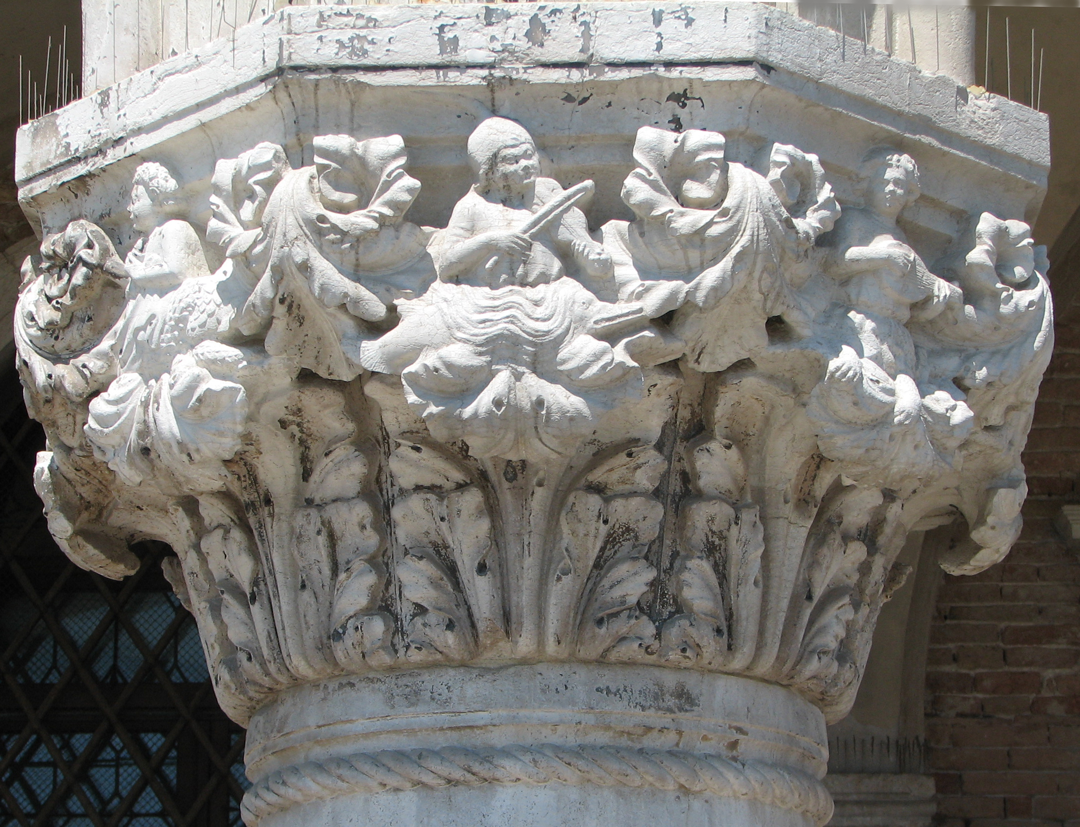 Detail of 8th capital in its current state. Side 8, left; side 1, Arion, centre; side 2 right.