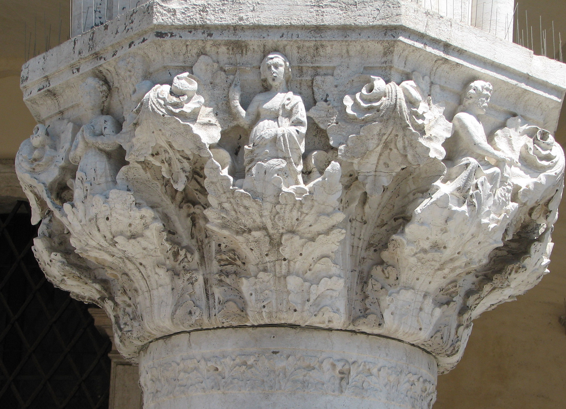 Detail of 29th capital in its current state Hope, side 8, left; Faith, side 1, centre; Fortitude, side 2, right