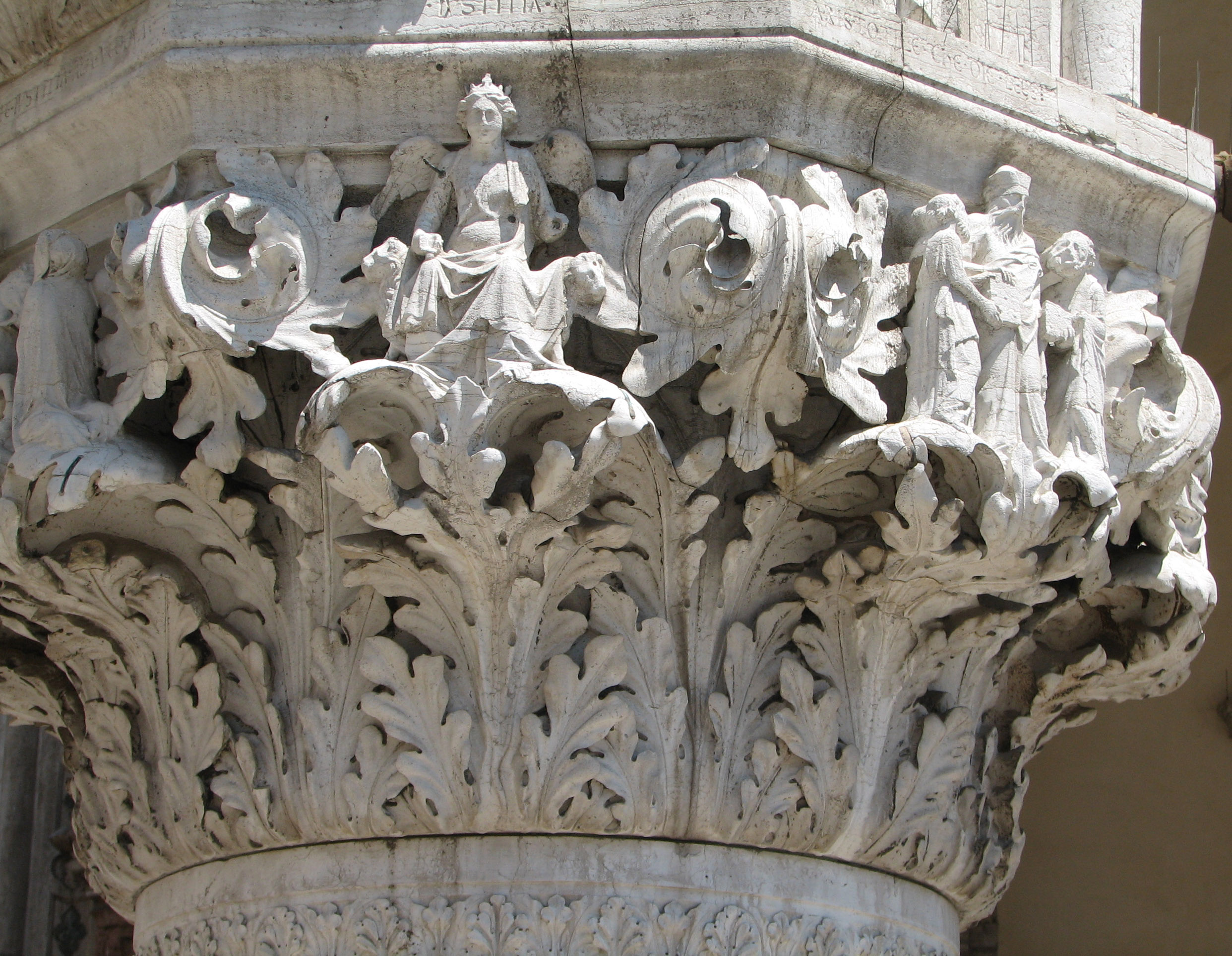 Detail of 36th capital in its current state Justice enthroned, side 1, centre; Aristotle with pupils, side 2, right; the widow from the scene of Trajan doing Justice from side 8 to the left