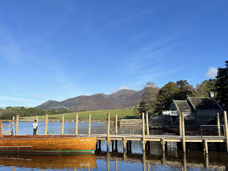 Keswick, Lake District. Blue sky with hills in the background.