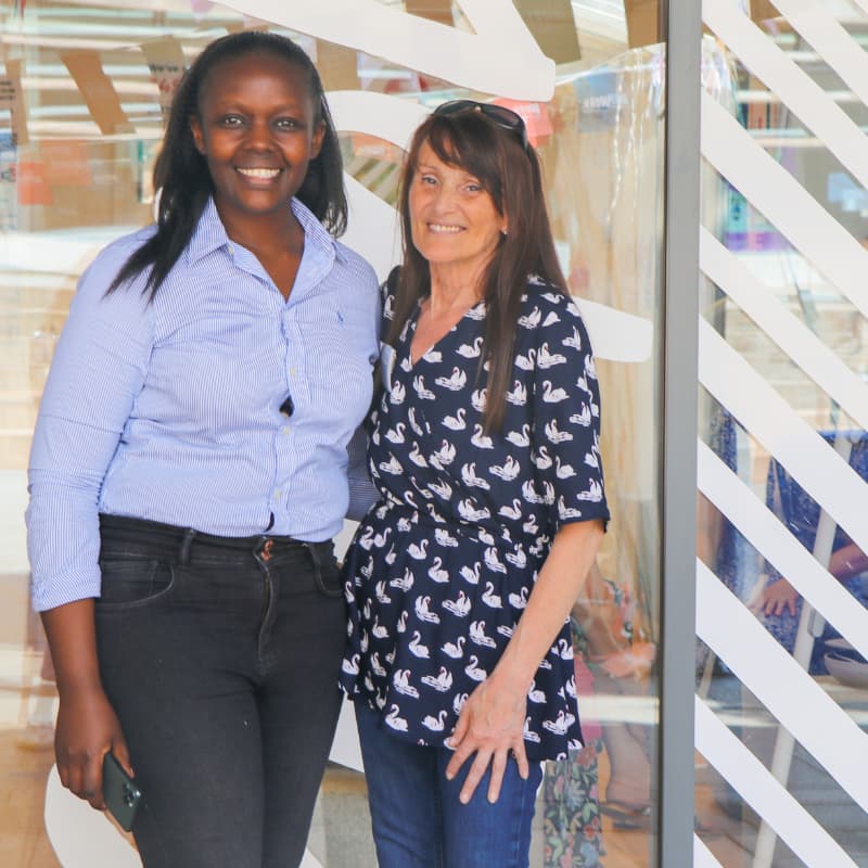 Anne Githu and Rachel Cox smiling in a photo together