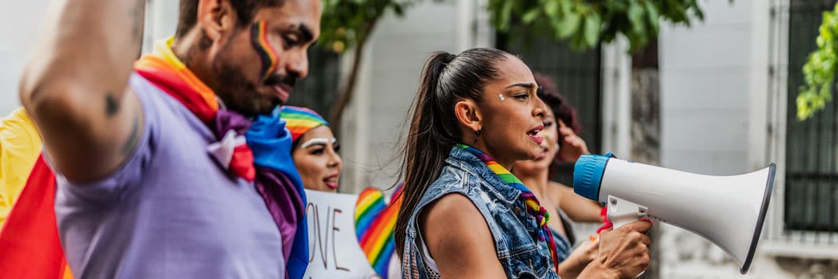  LGBTQIA+ people marching during social movement protesting outdoors