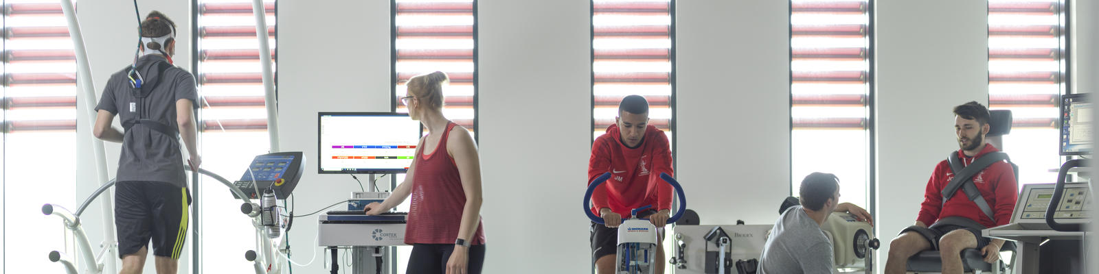 Students in Human Performance Lab working with sports equipment