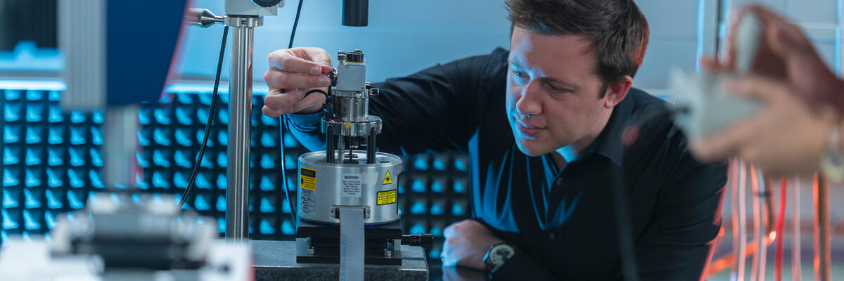 An academic working in an IsoLab pod