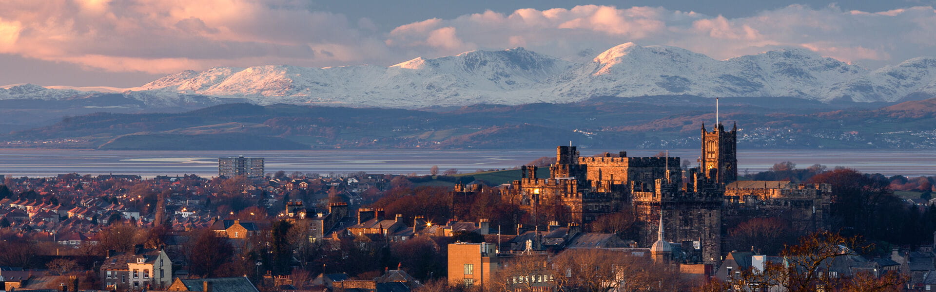 Lancaster skyline and snowy mountains