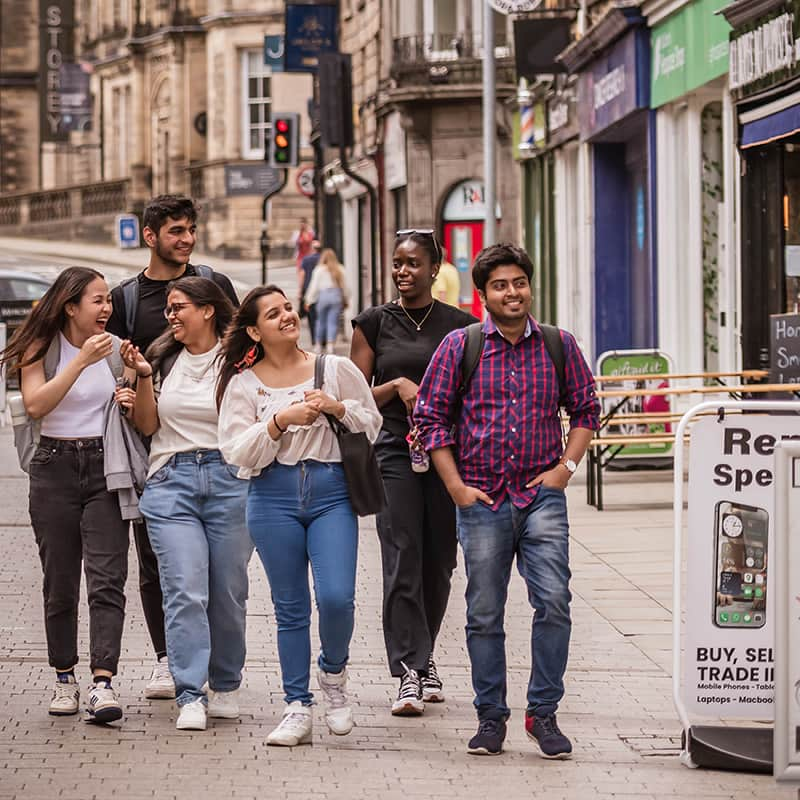 Group of students walking in Lancaster city centre