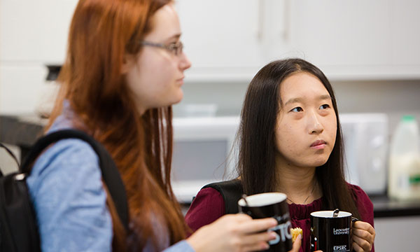 Students enjoy a coffee in our social space