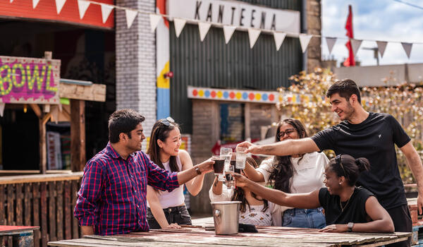 Students socialising at a bar