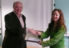 Corinne receiving prize