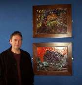 Michael Gutteridge with paintings